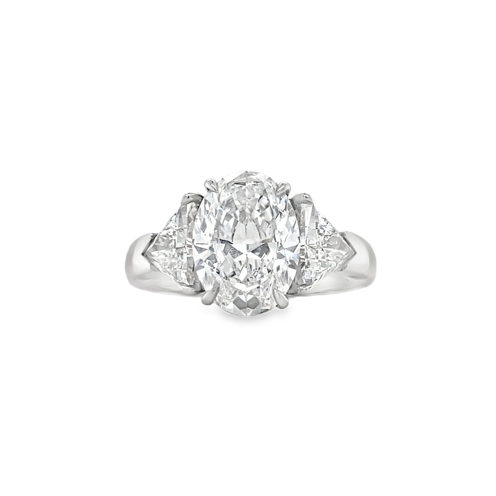 Hans Krieger's Platinum Oval & Trillion-cut Diamond Engagement