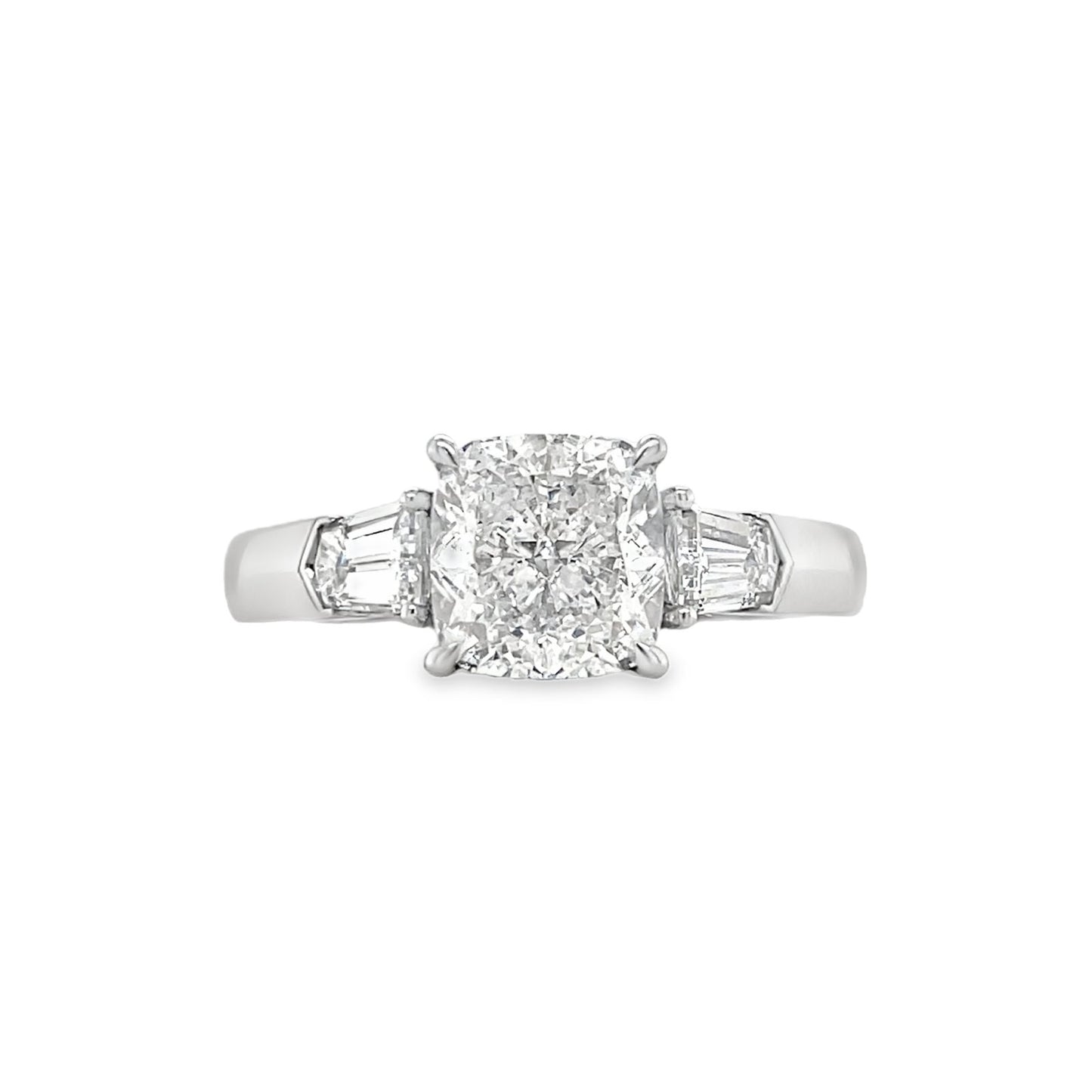 Hans Krieger's Platinum Tri-stone Diamond Engagement Ring