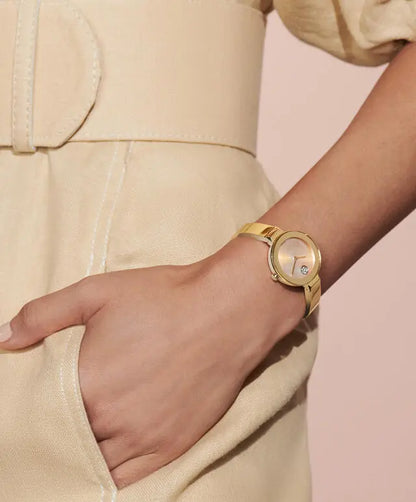 Movado's BOLD Bangle with Mother-of-Pearl Dial & Crystals