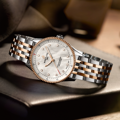 Breitling's Navtimer 32 with White Mother-of-Pearl Dial & Diamonds